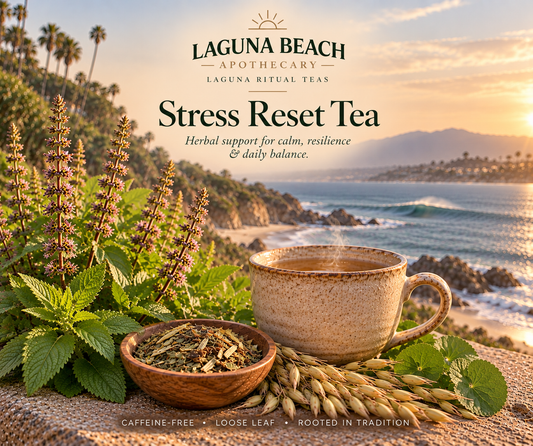 Stress Reset caffeine-free herbal tea by Laguna Beach Apothecary with lemon balm, Krishna Tulsi, oatstraw, a steaming cup, and the Laguna Beach coastline